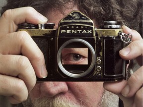 Gordon Beck with his beloved Pentax photographed in the Montreal Gazette photo studio in 1999 by colleague Allen McInnis.
