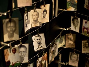 Family photographs of some of those who died hang in a display in the Kigali Genocide Memorial Centre in Kigali, Rwanda Saturday, April 5, 2014. The country will commemorate on April 7, 2019 the 25th anniversary of the beginning of the genocide, when Hutu extremists killed neighbours, friends and family during a three-month rampage of violence aimed at Tutsis and some moderate Hutus.