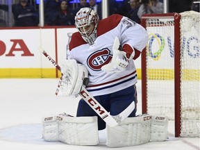 Canadiens goaltender Carey Price blocks a shot by the Capitals in Washington on Thursday, April 4, 2019. The Capitals won 2-1.