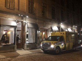 An ambulance sits outside a hotel in Old Montreal on Saturday April 13, 2019.