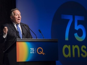 Premier François Legault speaks during an event to mark the 75th anniversary of Hydro- Québec in Montreal on Sunday.