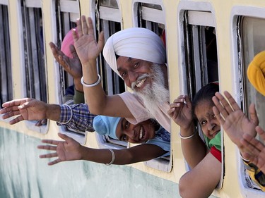 Indian Sikh pilgrims arrive at Wagah railway station in Pakistan, Friday, April 12, 2019 to attend their religious festival. Thousands of Sikh pilgrims arrived from neighboring India and other countries to attend the harvest festival Vasakhi, that is regionally known by many names and marks the Solar New Year.