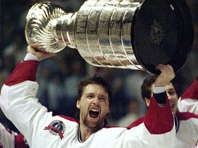 Patrick Roy holds the Stanley Cup aloft after the Montreal Canadiens won the Stanley Cup in 1993.