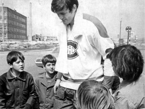 Canadiens player Pete Mahovlich attends a practice in Verdun on April 3, 1972. This photo of him surrounded by curious young fans appeared on Page 1 of the Montreal Gazette the following day. The Habs were practising in Verdun because the Forum was tied up with a rock show.