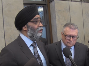 Defence Minister Harjit Sajjan is seen in this screen shot from Canadian Press video.