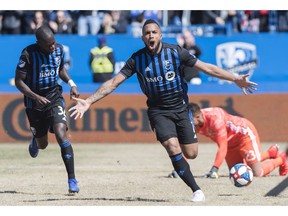 Impact's Harry Novillo, centre, reacts after scoring against Columbus Crew SC's goalkeeper Zach Steffen during second half MLS soccer action in Montreal, Saturday, April 13, 2019.