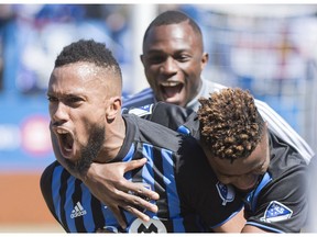 Montreal Impact's Harry Novillo, left, reacts after scoring against Columbus Crew SC during second half MLS soccer action in Montreal, Saturday, April 13, 2019.