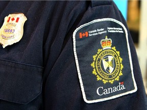 A Canadian Border Services Agency (CBSA) officer stk
