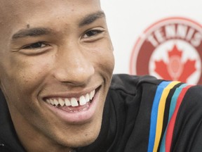 Tennis player Félix Auger-Aliassime speaks to reporters during a news conference in Montreal on Tuesday, April 2, 2019.
