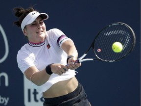Bianca Andreescu returns to Anett Kontaveit, of Estonia, during the Miami Open tennis tournament, Monday, March 25, 2019, in Miami Gardens, Fla. An injury to rising Canadian tennis star Andreescu will keep her off the country's Fed Cup team for a World Group playoff against reigning champion Czech Republic later this month.