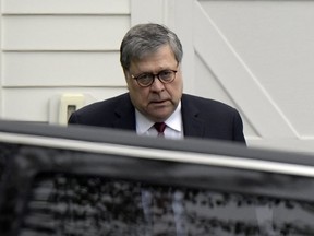 Attorney General William Barr leaves his home in McLean, Va., on Thursday morning, April 18, 2019.