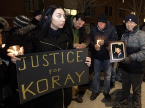 Friends and family gather for a vigil for Koray Kevin Celik on March 6, 2018, a year after his death.