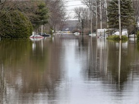 A flooded street in Ste-Marthe-sur-le-Lac on April 29.