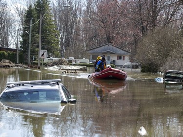 A submerged police car is seen in Sainte-Marthe-sur-le-Lac, Quebec April 30, 2019.