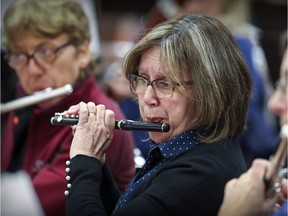 Debra Olsthoorn plays the piccolo as the Lakeshore Concert Band rehearses for their upcoming concert, to be held at Lindsay Place High School in Pointe-Claire, May 25 at 7:30 p.m. For tickets, call 514-428-0292.