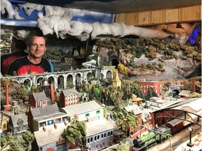Ivan Dow, seen here at home with his model train layout, is organizing a model railroads exhibition at the Dorval Arena on Saturday and Sunday. The exhibition is a  benefit for the  Sun Youth Organization.