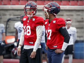 Quarterbacks Matthew Shiltz, left, and Antonio Pipkin wait their turns during Alouettes training camp practice on Friday, May 24, 2019.