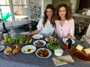 “There is not a single memory of my childhood that is not related to food,” says Fisun Ercan, right, with columnist Heidi Small in the soon-to-be-completed sunroom of Ercan’s renovated St-Jean-sur-Richelieu farmhouse.