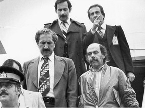 Marc Carbonneau (front, right) returns to Quebec on May 25, 1981 to face justice in connection with his participation in the 1970 kidnapping of James Cross. This photo was published on Page 1 of the Montreal Gazette the following day.