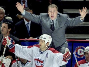 Head coach Michel Therrien and Montreal Canadiens forward Doug Gilmour are up in arms on Jan. 30, 2002.