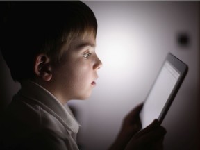 A child uses a tablet.