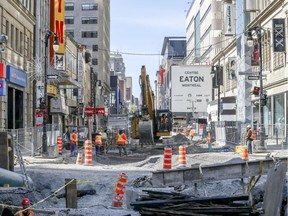 Work on the reconstruction of Ste-Catherine St. at the corner of Robert-Bourassa Blvd.