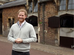 TOPSHOT - Britain's Prince Harry, Duke of Sussex, speaks to members of the media at Windsor Castle in Windsor, west of London on May 6, 2019, following the announcement that his wife, Britain's Meghan, Duchess of Sussex has given birth to a son. - Meghan Markle, the Duchess of Sussex, gave birth on Monday to a "very healthy" boy, Prince Harry announced. "We're delighted to announce that Meghan and myself had a baby boy early this morning -- a very healthy boy," a beaming Prince Harry said.