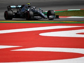 Valtteri Bottas of Finland steers his Mercedes during Friday practice for the Spanish Grand Prix. The championship leader posted the fastest lap time of the day.