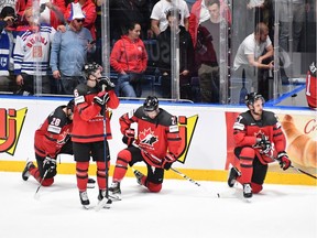 Canada's players react after the IIHF Men's Ice Hockey World Championships final between Canada and Finland on May 26, 2019 in Bratislava.