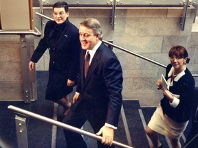 Phyllis Lambert leads Prime Minister Brian Mulroney and Mila Mulroney on a visit to the newly opened Canadian Centre for Architecture in Montreal on May 7, 1989.