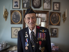 D-Day veteran Martin Maxwell poses for a photograph at his home in North York, Ontario on Thursday, May 16, 2019.