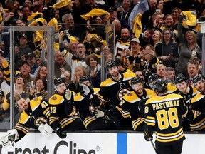 Bruins forward David Pastrnak celebrates with teammates after scoring a goal against the Blue Jackets during the third period of Game 5 of the Eastern Conference Second Round playoff series at TD Garden in Boston on Saturday, May 4, 2019.