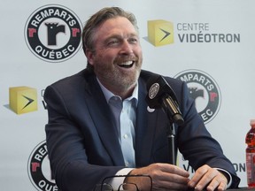 Hall of Fame goaltender Patrick Roy smiles as he announces his comeback with the Quebec Remparts of the QJMHL in 2018.