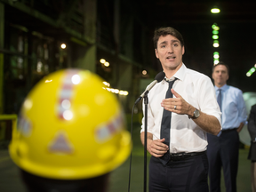 Prime Minister Justin Trudeau answers questions from reporters following a visit to Stelco in Hamilton, Ont., May 17, 2019.