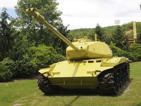 An M-41 Bulldog World War II period tank that sits at the entrance of Bluefield's Lotito City Park. It was mysteriously painted a lemon-lime green color in Bluefield, W. Va.