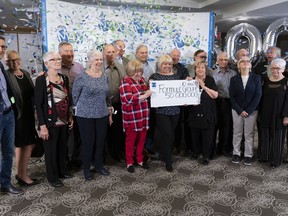 Lottery winners, most from the South Shore of Montreal, are showered with confetti as they celebrate their $50-million jackpot from Lotto Max's May 3 draw, Friday, May 10, 2019. The jackpot will be split 20 ways, with each share worth $2.5 million.