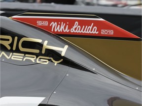 The name of three-time F1 world champion Niki Lauda appears on Romain Grosjean's Haas race car during Thursday practice for the Monaco Grand Prix.
