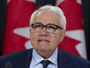 Official Languages Commissioner Raymond Theberge responds to a question during a news conference in Ottawa, Thursday, May 9, 2019.