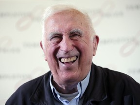 FILE - In this March 11, 2015 file photo, Jean Vanier, the founder of L'ARCHE, an international network of communities where people with and without intellectual disabilities live and work together, laughs during a news conference, in central London. Vanier, a Canadian religious figure whose charity work helped improve conditions for the developmentally disabled in multiple countries over the past half-century, has died Tuesday May 7, 2019 in Paris after suffering from thyroid cancer at 90.
