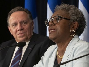 "I am determined to identify concrete solutions for our children," said Régine Laurent, as she was introduced by Quebec Premier François Legault as head of a commission looking into the youth-protection system.