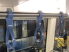 Photo from STM site shows hand straps on métro car.