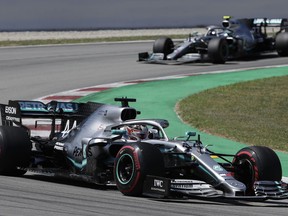 Mercedes driver Lewis Hamilton of Britain leads his teammate Mercedes driver Valtteri Bottas of Finland during the Spanish Formula One race at the Barcelona Catalunya racetrack in Montmelo, just outside Barcelona on Sunday, May 12, 2019.