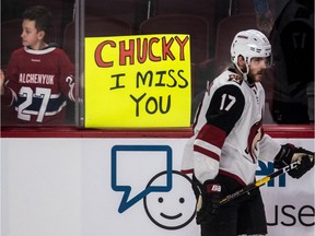 Arizona Coyotes forward Alex Galchenyuk skates past a fan before game against the Canadiens at the Bell Centre in Montreal on Jan. 23, 2019.