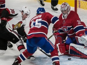 Ottawa Senators centre Matt Duchene can't get to the loose puck as Canadiens blue-liner Joe Morrow defends in front of goaltender Carey Price at the Bell Centre on Feb. 4, 2018.