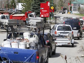 Motorists line up outside the closed gates at the Côte-des-Neiges Ecocentre in Montreal on May 7, 2019.