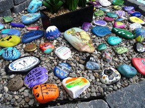 A kindness garden in Brantford, Ont. features rocks painted with messages of kindness and positivity, and passers-by are invited to take them. If news about acts of kindness often goes viral, it's because other things are causing people to lose faith in humanity, Martine St-Victor says.