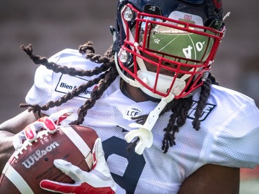 The Montreal Alouettes running back Shaquille Murray-Lawrence sports a stylish mirror shield on his helmut during spring training camp at Percival Molson Stadium in Montreal on Monday June 3, 2019.