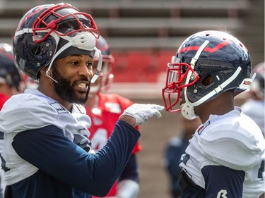 The Montreal Alouettes wide receiver BJ Cunningham, left, and wide receiver Zac Parker chat during spring training camp at Percival Molson Stadium in Montreal on Monday June 3, 2019.