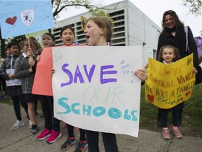 Students, parents and teachers formed a chain around General Vanier Elementary school in Montreal on June 5, 2019.