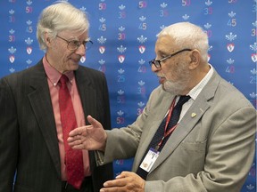 Psychiatrist Dr. Alec Ramsay, left, and nephrologist Dr. Mort Levy, right, during reception at the MUHC on Wednesday honouring staff for 25 years of service and more. Both Ramsay and Levy have 50 years of service.